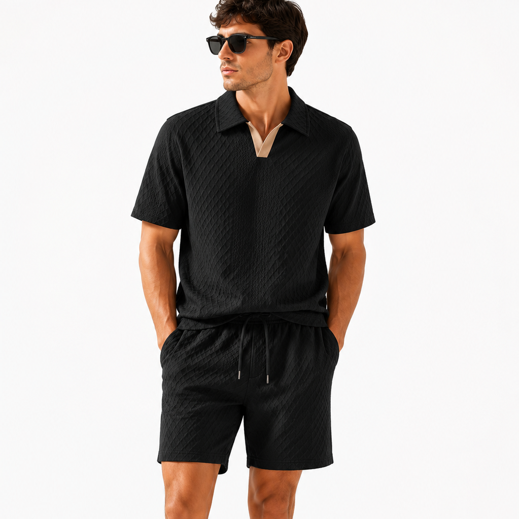Black textured short sleeve polo shirt and matching shorts, front view.