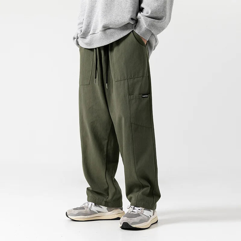 Men's Cotton Drawstring Straight Leg Pants in beige — full front view on model