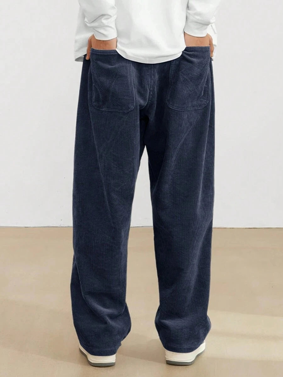 Men's Loose Fit Corduroy Straight Pants in brown — corduroy ribbed fabric close-up