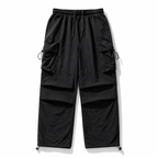 Men's Loose Fit Pocket Cargo Pants in brown — cargo pocket close-up detail