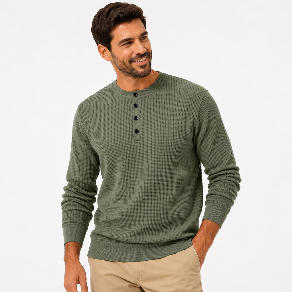 Man wearing a green textured sweater on a white background