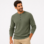 Man wearing a green textured sweater on a white background